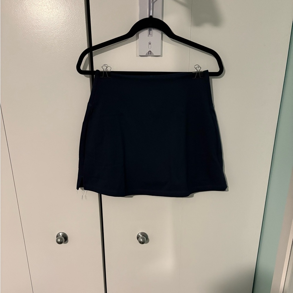 2 Girlfriend collective Navy Activewear skorts